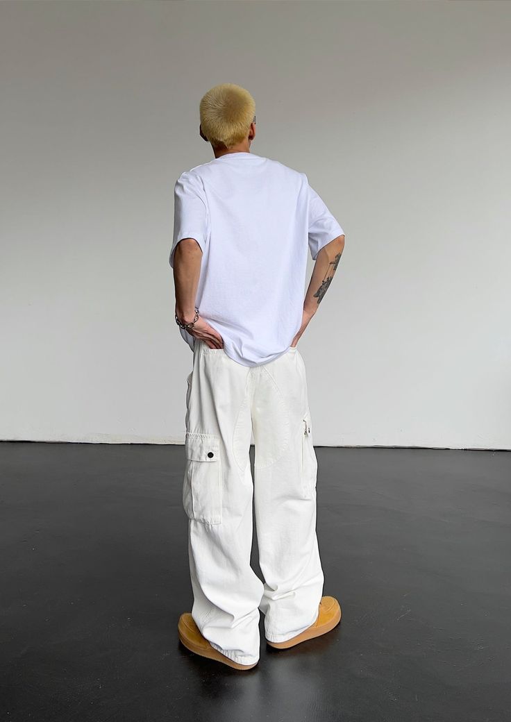 Model is 5ft 9''(176cm) tall, 145 lbs(66kg) weight and wearing a size L168cm 59kg wearing a size M - Tooling cargo- Adjustable waist- Side pockets- Straight fit- 5 colors White Full-length Cargo Jeans With Pockets, White Cargo Pocket Trousers, White Parachute Pants With Hip Pockets For Streetwear, White Cotton Pants With Cargo Pockets, White Casual Cargo Pants, Full Length White Cotton Cargo Jeans, White Cotton Bottoms With Cargo Pockets, White Parachute Pants With Multiple Pockets For Streetwear, White Parachute Pants With Multiple Pockets