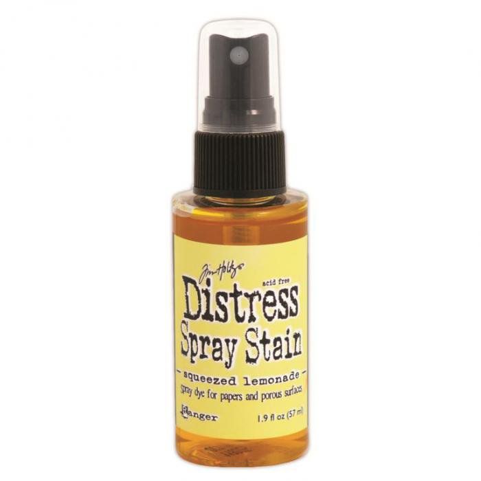 a bottle of distress spray on a white background