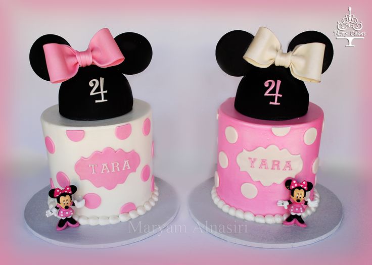 two mickey and minnie mouse birthday cakes