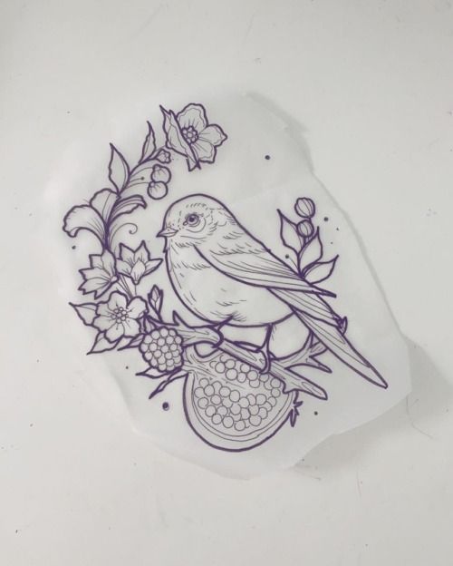 a bird sitting on top of a piece of paper with flowers and butterflies around it