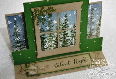 an open window with snowflakes on it and the words silent night written below