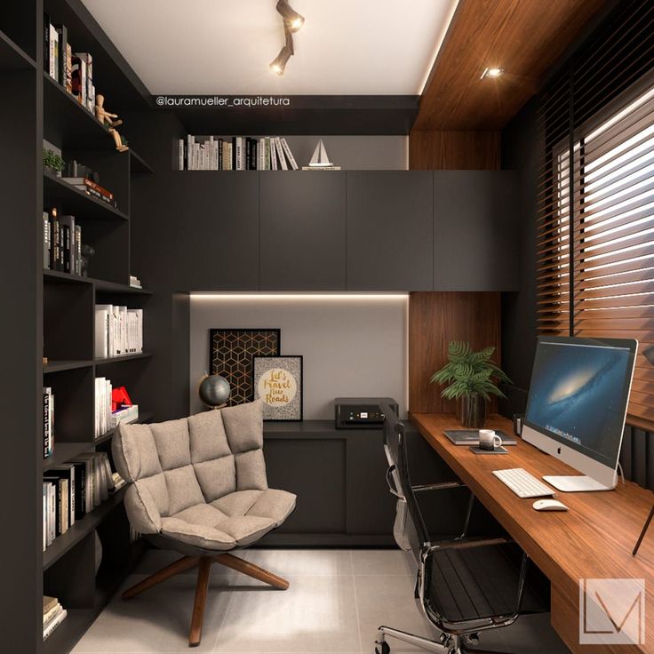 a home office with black walls and wooden shelves