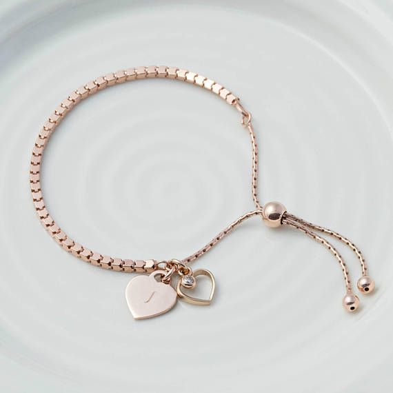 A beautiful cube link slider charm bracelet, in gorgeous rose gold.  An open rose gold heart charm sits in a cluster with a heart charm to be engraved with the initial of your choice, a little rose gold set Swarovski crystal adds a bit of sparkle.  This bracelet is sure to become a much Cube Bracelet, Friendship Heart, Gold Cube, Gold Heart Bracelet, Pretty Accessories, Bracelet Sets, Bracelet Rose Gold, Open Rose, Rose Gold Heart