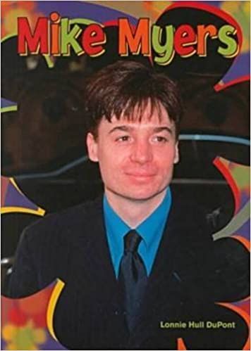 a young man wearing a suit and tie in front of a colorful background with the words mike myers on it