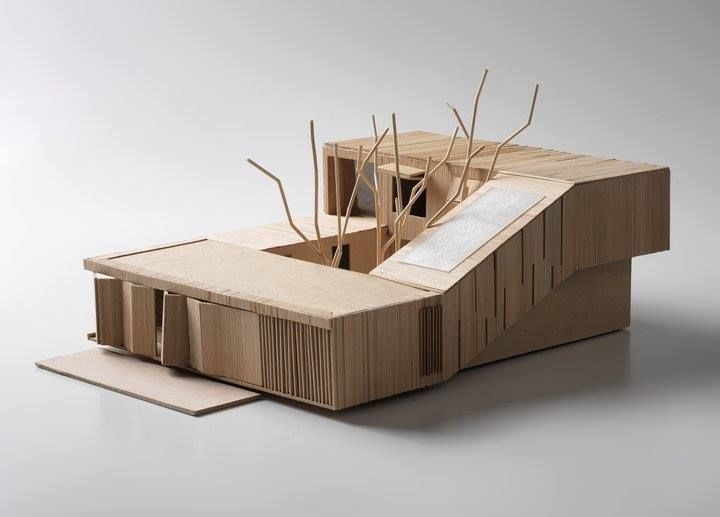 a wooden structure that has been cut into pieces and placed on top of each other