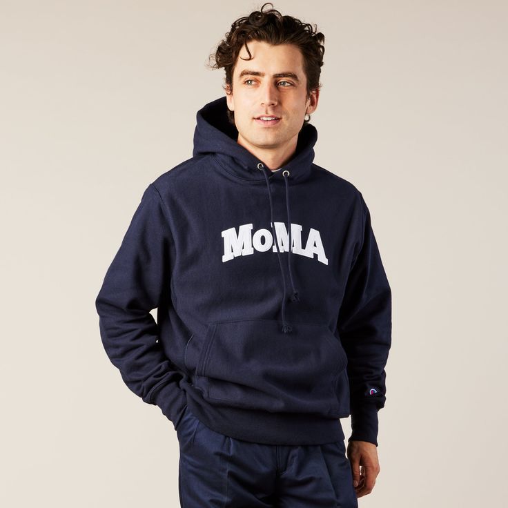 MoMA Exclusive: Champion first produced this hoodie sweatshirt in the 1930s to keep athletes warm during training. Our version has �MoMA� appliqu�d in classic college-style lettering. The MoMA Champion Hoodie was first produced in connection with MoMA's 2017 exhibition Items: Is Fashion Modern? An original version of the Champion Hoodie from the 1980s is an object in MoMA's collection. Vintage Hoodie With Double-lined Hood For Sports, Collegiate Sweats For College Sports Season, Varsity Cotton Hoodie With Embroidered Logo, Classic Letter Print Sweatshirt For Streetwear, Navy Sporty Hoodie With Embroidered Logo, Varsity Sports Hoodie With Letter Print, Collegiate Sweats With Letter Print For College, Collegiate Style Letter Print Sweats For College, Collegiate Hoodie Sweatshirt For Sports