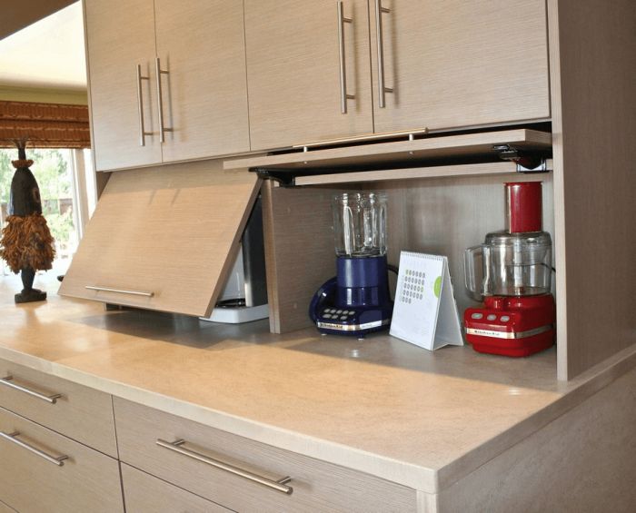 a kitchen counter with some appliances on it