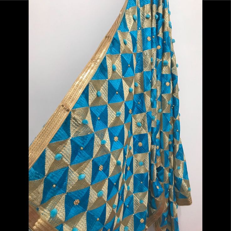 Brand New Phulkari Dupatta Light Blue And Golden Color Standard Size Blue Bohemian Traditional Wear With Zari Work, Festive Blue Self-design Dupatta, Bohemian Blue Dupatta With Pallu, Blue Bohemian Dupatta For Festive Occasions, Bohemian Blue Dupatta For Festive Occasions, Bohemian Blue Festive Dupatta, Traditional Blue Saree With Gota Work, Blue Festive Dupatta For Festivals, Blue Saree With Gota Work For Festivals