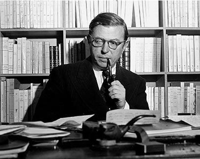 a man holding a magnifying glass in front of a bookcase filled with books