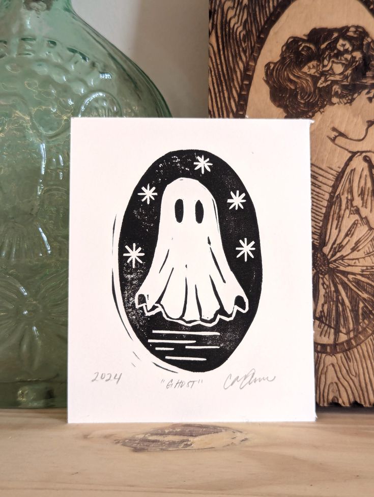 a black and white drawing of a ghost