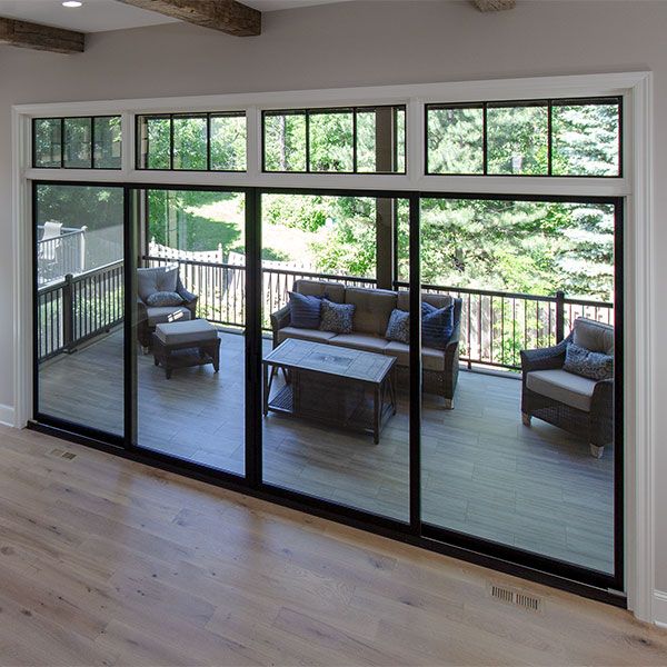 an open living room with sliding glass doors