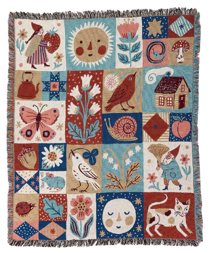 a patchwork wall hanging with animals and birds on it's sides, in various colors