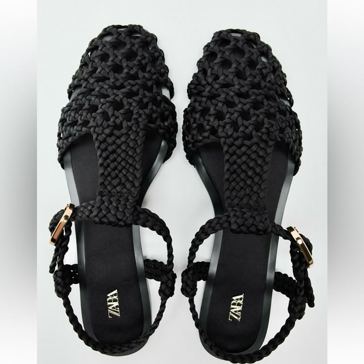 Genuine Zara New With Tag Material: Sateen Effect Fabric Upper Color: Black Simple & So Chic Flat Cage Sandals. Love Love Woven Sateen Upper, T-Strap, & Buckle Closure. Euro Size 39(8), 40(9) Chic Jelly Sandals For Vacation, Black Ankle Strap Jelly Sandals For Party, Chic Black Jelly Sandals For Summer, Trendy Black Ankle Strap Jelly Sandals, Summer Black Flat Jelly Sandals, Black Flat Jelly Sandals For Summer, Trendy Black Jelly Sandals For Vacation, Chic Black Jelly Sandals With Round Toe, Black Jelly Sandals For Beach