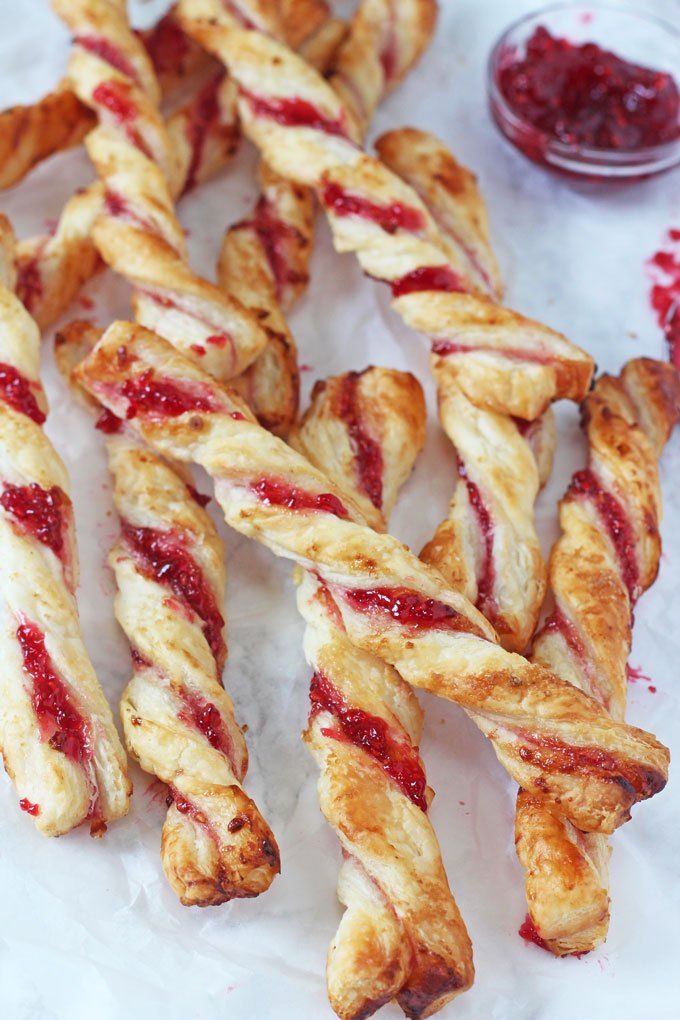 several twists of pastry with jelly on them