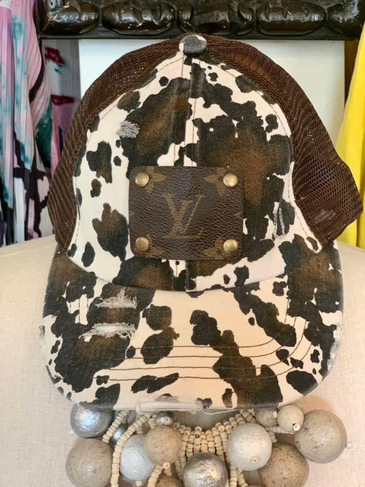 Beautiful upcycled fashion baseball caps with Original Louis Vuitton leather patches adhered to them by Keep It Gypsy. this hats are fabulous and will sell fast. We are so happy we were able to get more colors. ENJOY!!!!! :) Upcycled work handmade in the USA. This product has not been endorsed by Louis Vuitton and does not fall under any warranty by Louis Vuitton. The purchaser of the Keep It Gypsy product understands and acknowledges that the product is not a Louis Vuitton product. Brown Snapback Trucker Hat For Spring, Brown Brimmed Baseball Cap, Brown Spring Trucker Hat, Brown Country Style Baseball Cap With Curved Brim, Trendy Brown Hat For Outdoor Use, Casual Brown Leather Trucker Hat, Brown Trucker Hat Baseball Cap For Spring, Brown Snapback Baseball Cap - One Size, Brown Trucker Hat For Spring