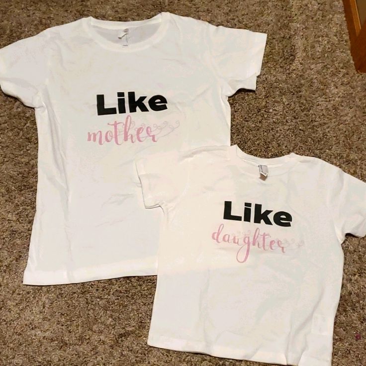 Size Medium (But Looks More Like A Small) Women's T Shirt And Child 5/6. Twin With Your Daughter! Never Worn. Bin 3 Pre-shrunk White Shirt For Mother's Day, White Relaxed Fit T-shirt For Family Matching, Spring Matching Crew Neck T-shirt, Matching Crew Neck T-shirt For Spring, Basic White Shirt With Name Print, White Basic Shirt With Name Print, Cute White T-shirt For Mother's Day, Cute White Tops With Logo Print, Cute White Top With Logo Print