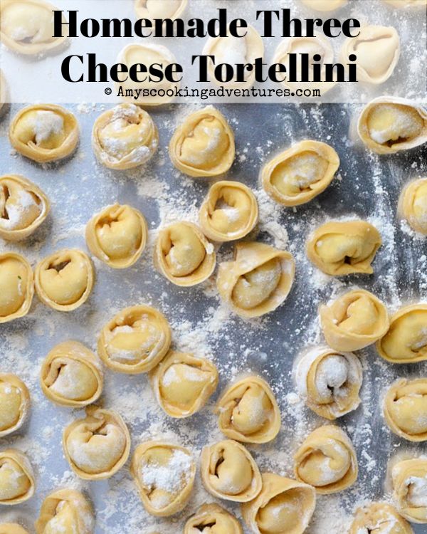 homemade three cheese tortellini on a baking sheet