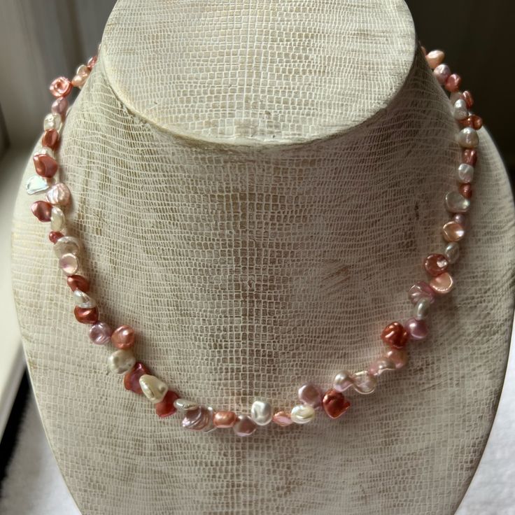 18" Necklace Features Pink, Orange And Red Freshwater Keshi Pearls. Like New Condition. Smoke Free Home. Elegant Coral Hand-strung Necklaces, Hand-strung Red Coral Beaded Necklace For Gifts, Unique Hand-strung Orange Necklace, Peach Faceted Round Beads Jewelry, Keshi Pearl Necklace, Unique Hand-strung Red Coral Necklaces, Keshi Pearls, Womens Jewelry Necklace, Pink And Orange