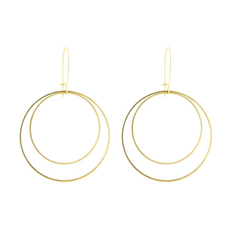 Our Large Double Circle Earring is the perfect modern hoop that works with every look and is perfect to wear as your daily earring. They are big enough to be noticeable, but lightweight enough to wear all day long without ear fatigue. 40mm & 20mm circles Closed short kidney style brass wire 2.5″ inch style earring Available in brass or silvertone Modern Hoop Wrap Earrings With Ear Wire, Modern Everyday Circular Hoop Earrings, Modern Open Circle Pierced Hoop Earrings, Modern Round Linear Earrings For Everyday, Modern Round Linear Earrings For Everyday Wear, Everyday Metal Hoop Earrings With Ear Wire, Modern Adjustable Hoop Wrap Earrings, Adjustable Modern Hoop Wrap Earrings, Modern Nickel-free Hoop Wrap Earrings