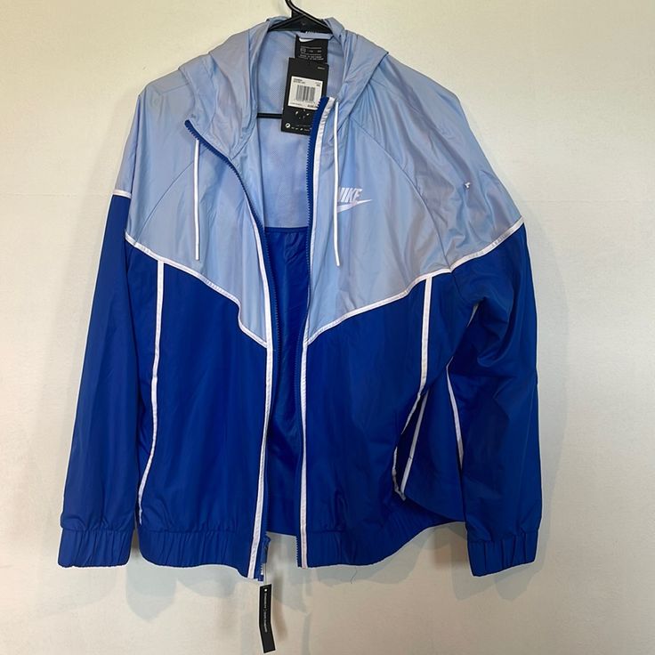 Nwt Columbia Blue And Powder Blue Nike Wind Breaker Blue Nylon Sports Outerwear, Blue Sporty Nylon Outerwear, Blue Nylon Outerwear For Sports, Casual Blue Windbreaker For Streetwear, Blue Athleisure Outerwear For Streetwear, Blue Sports Windbreaker For Spring, Sporty Blue Nylon Windbreaker, Blue Nike Nylon Outerwear, Blue Nylon Nike Outerwear