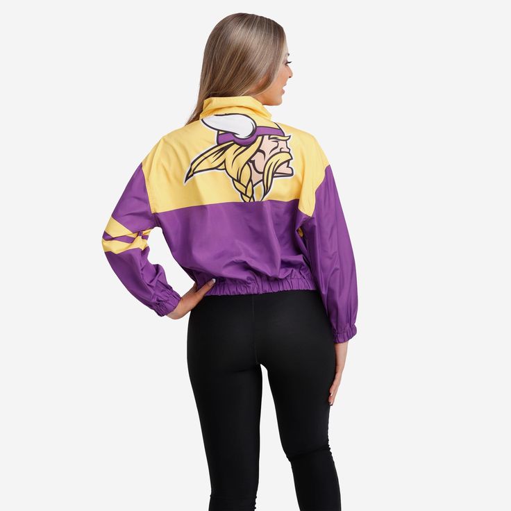 This Minnesota Vikings Women's Winning Play Windbreaker has a bold team logo on the back, so you can show off your team spirit to everyone you leave in the dust while you run the track. Features All-over team-colored design so you can rep the team in style Team logo display on upper left chest, in case there were any doubts where your allegiances lie Bold team logo display on reverse side for an additional dose of awesome Left arm stripes Half-zip structure Long sleeves, so you can fan on even i Viking Woman, Logo Display, Minnesota Vikings, Leave In, Team Spirit, Half Zip, Team Logo, Minnesota, Vikings