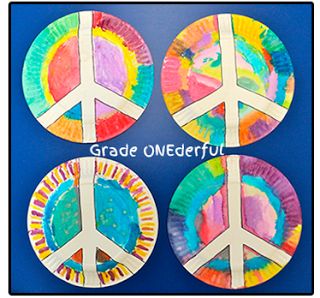 four paper plates with peace signs painted on them and the words grade onederfu written in