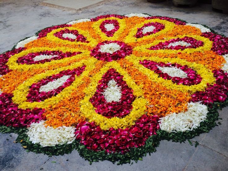 a large flower arrangement on the ground