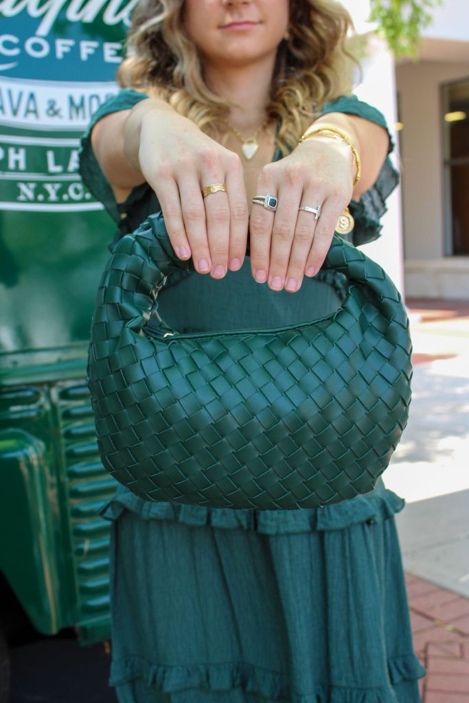 Aliyah Woven Bag In Hunter Green SKU | 94246 THIS ITEM IS FINAL SALE Versatile Green Shoulder Bag With Braided Handles, Trendy Green Satchel With Handle Drop, Chic Green Shoulder Bag With Braided Handles, Versatile Pouch Bag With Braided Handles, Trendy Green Hobo Bag With Braided Handles, Top Handle Baguette Bag With Braided Handles For Shopping, Shopping Baguette Bag With Braided Top Handle, Versatile Green Bag For Fall, Versatile Green Bags For Fall