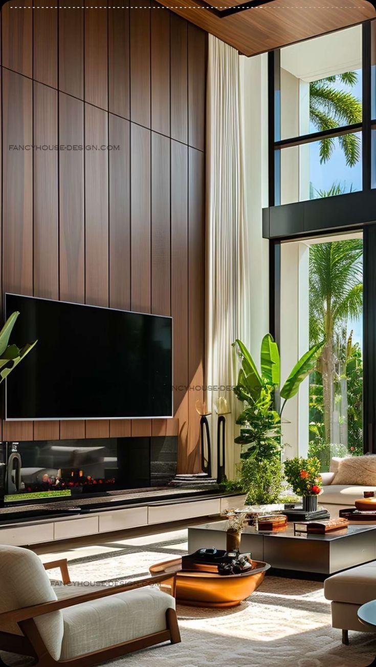 a living room filled with furniture and a flat screen tv mounted on a wall above a fireplace