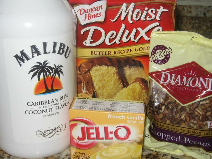 some food items are sitting on a counter top next to a bottle of milk and two bags of cookies