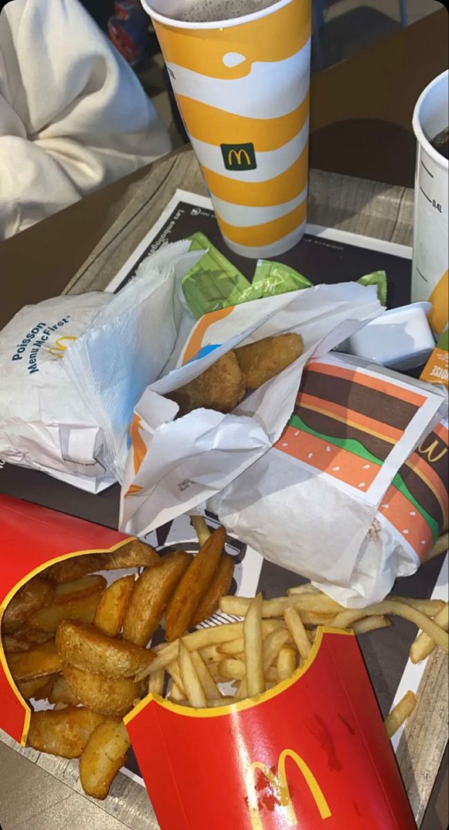 french fries and mcdonald's are sitting on a table