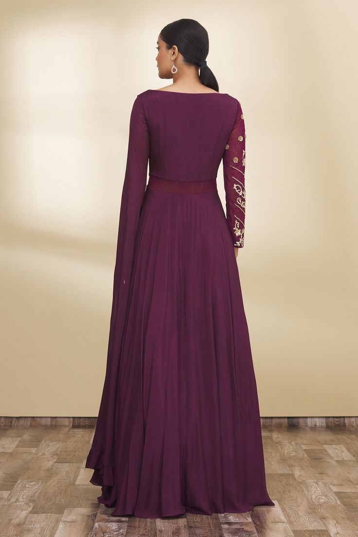 Wine gown highlighted with floral embroidered yoke, cape-style sleeve, sheer waist panel and floor length.
Component: 1
Embroidered
Neckline: Round
Sleeve Length: Asymmetric
Color: Maroon
Sheer waist panel
Cape-style sleeve - Aza Fashions Semi-stitched Evening Dress With Sheer Dupatta, Elegant Floor-length Gown With Resham Embroidery, Elegant Anarkali Set With Resham Embroidery And Cape Sleeves, Elegant Anarkali Set With Cape Sleeves And Dupatta, Anarkali Evening Set With Cape Sleeves, Designer Floor-length Gown With Intricate Embroidery, Festive Fitted Anarkali Set With Cape Sleeves, Evening Anarkali Sets With Cape Sleeves, Designer Festive Dress With Cape Sleeves