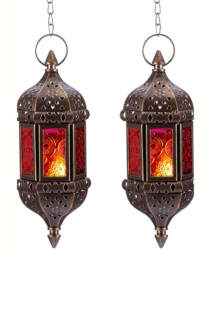 two red lanterns hanging from chains on a white background, one is lit and the other is closed