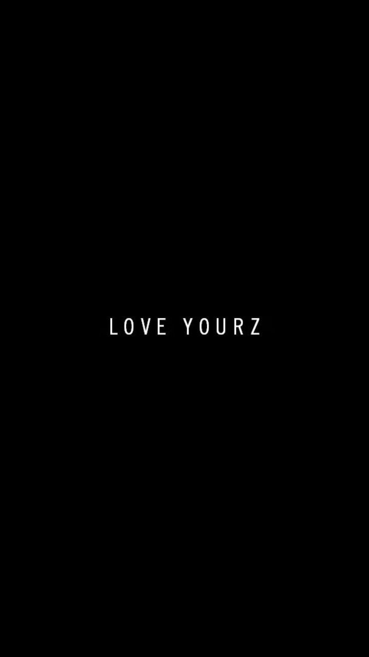 a black background with the words love yourz written in white on it's left side