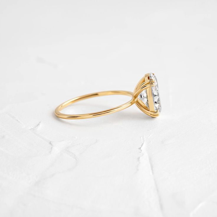 Filament Ring, Oval Cut Diamond | Melanie Casey Fine Jewelry Melanie Casey, Basket Setting, Ring Oval, Oval Cut Diamond, Delicate Jewelry, Yellow Rose, Lighting Collections, Oval Cut, Rose Gold Ring