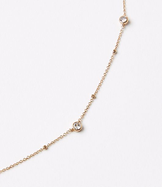 Luxuriously plated in 24kt gold and sparkling with cubic zirconia stones, this effortlessly dazzling necklace is an outfit finish to treasure forever. ,Imported:Imported Loft Demi Fine Scattered Pave Necklace Gold Women's by Loft Size Regular - One Size Gold Women's Necklaces, Jewelry Dainty Diamond Accent Necklace For Parties, Dainty Necklace With Diamond Accents For Party, Dainty Party Necklace With Diamond Accents, Sparkling Rose Gold Cubic Zirconia Necklace, Gold Necklace With Sparkling Details, Gold Plated Necklaces With Sparkling Stones For Anniversary, Yellow Gold Sparkling Round Necklaces, Sparkling Yellow Gold Round Necklace, Anniversary Gold Plated Necklaces With Sparkling Stones