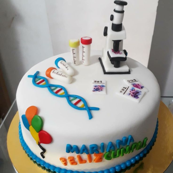 a birthday cake with a science theme on it