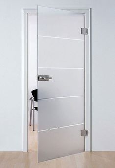 an open glass door in a white room