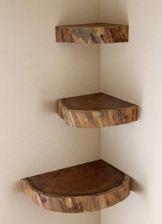 two wooden shelves in the corner of a room