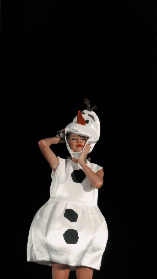 a woman in a costume that looks like a snowman