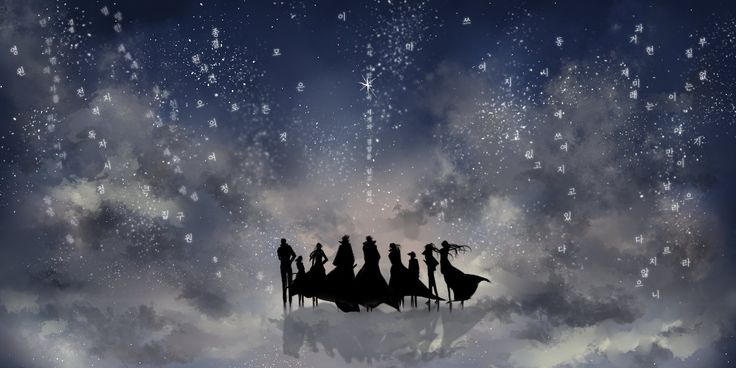 a group of people standing on top of a snow covered hill under a sky filled with stars