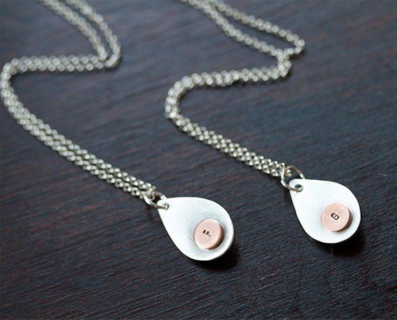 A necklace personalized with someone special to you by wearing the initial and matching birthstone close to heart.  The teardrop is hand cutout from a 18g (i.e. ~1mm thick) sterling silver sheet.  The width and height of the teardrop (widest & tallest) is about 1/2" & 3/4" respectively.  On one side of the pendant is the 4mm birthstone set in a bezel cup and the opposite side is a 1/4" copper dot punch with a single initial.  The pendant is hang from a 16" sterling silver chain.  This is also a Personalized Silver Teardrop Jewelry, Personalized Silver Teardrop Necklace, Personalized Drop Jewelry For Anniversary, Personalized Drop Jewelry For Anniversaries, Sterling Silver Teardrop Birthday Necklaces, Sterling Silver Teardrop Necklace For Birthday, Sterling Silver Teardrop Necklace For Birthdays, Sterling Silver Teardrop Charm Necklace For Anniversary, Silver Rings With Stones