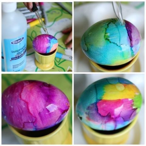 the process of painting an egg with acrylic paint