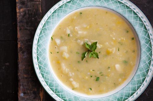 a bowl of soup is sitting on a table