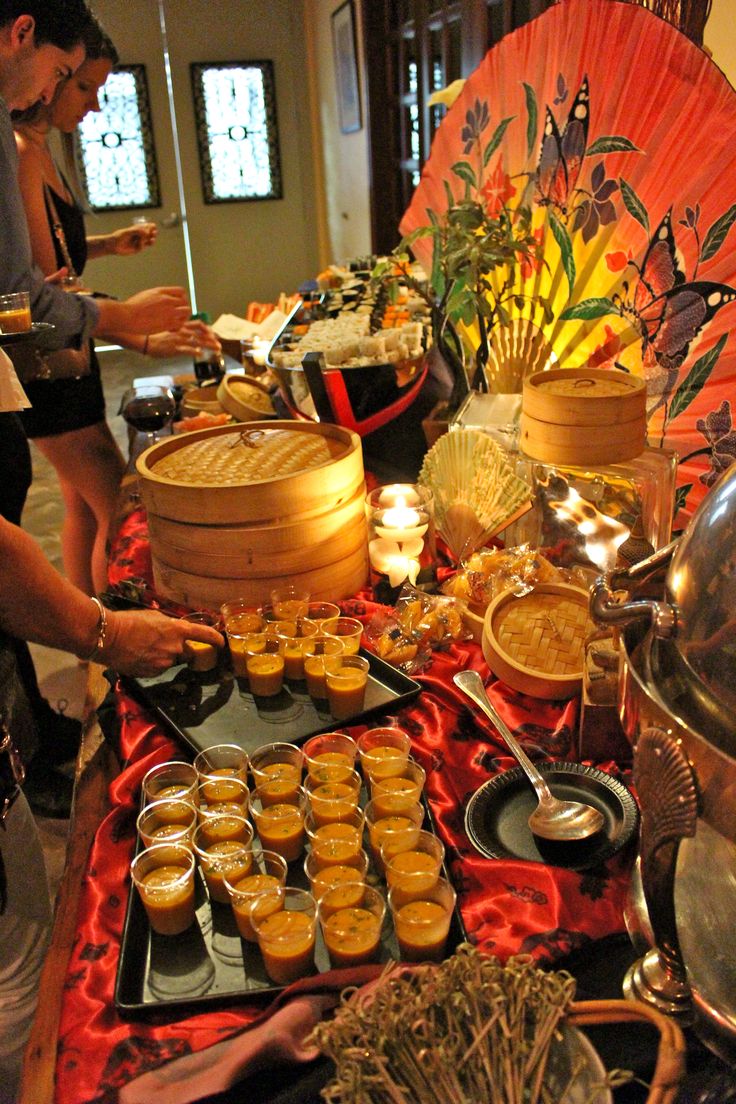 a buffet table filled with lots of food