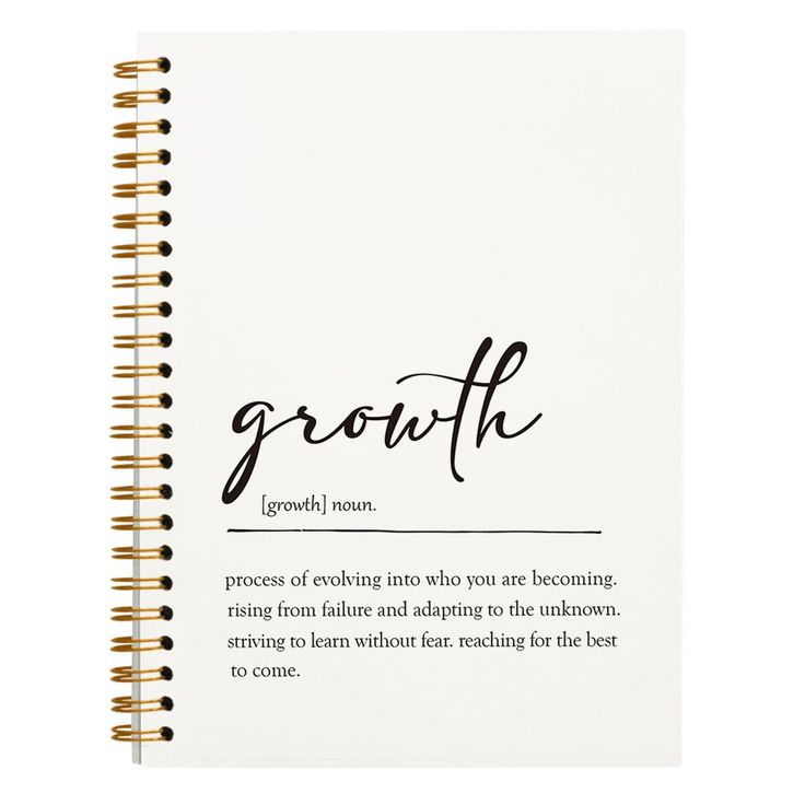 a spiral notebook with the words growth written in cursive writing on top of it