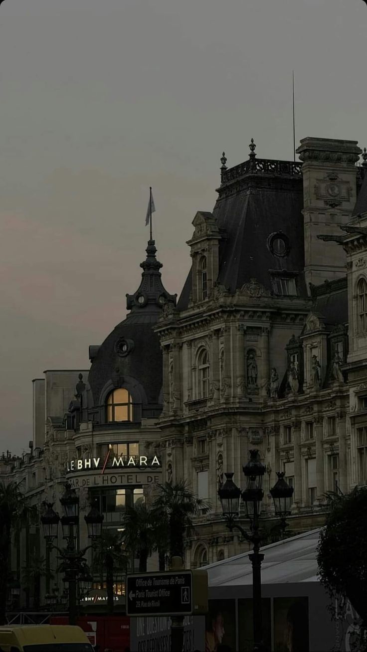 an old building is lit up at night