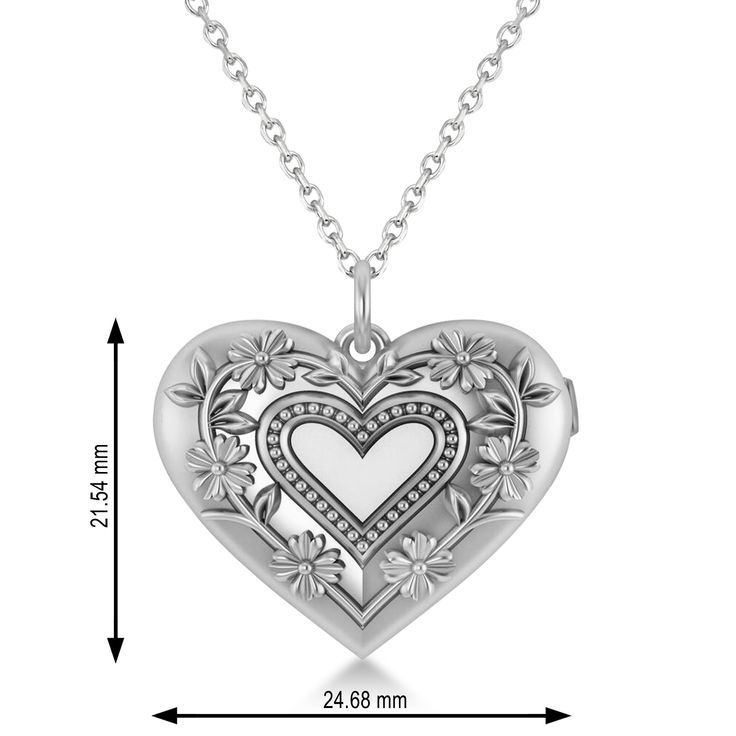 Style Number - AZ17876
This beautiful locket will go straight to her heart with a beautiful floral design ingrained into this locket pendant's 14k white gold setting.This picture locket opens to reveal two photo holders to securely hold images of the things you hold most dear and comes with your choice of a matching gold 16 or 18 chain. The back of this locket can be engraved with the text of your choosing. Engraved White Gold Open Heart Jewelry, Elegant Medallion Locket Necklace For Mother's Day, Heart Locket Necklace For Anniversary, Heart Pendant Locket Necklace For Wedding, Wedding Heart Medallion Locket Necklace, Engraved Open Heart White Gold Jewelry, Heirloom White Gold Locket Necklace, Elegant Double Heart Engraved Locket Necklace, Locket For Anniversary Gift