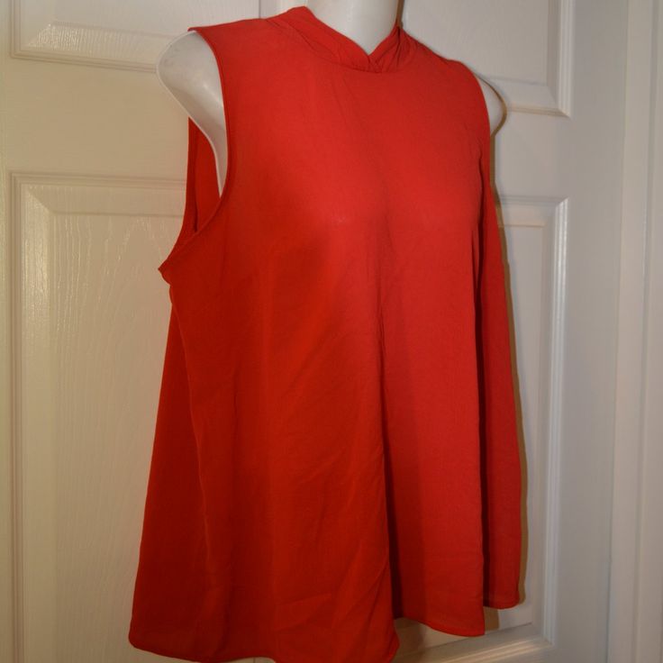 100% Polyester Red Sleeveless Top For Fall, Red Stretch Top For Work, Red Stretch Top For Workwear, Red Stretch Tops For Work, Red Stretch Sleeveless Blouse, Casual Red Tops For Work, Red Summer Top For Workwear, Red Spring Workwear Tops, Red Tops For Workwear In Spring