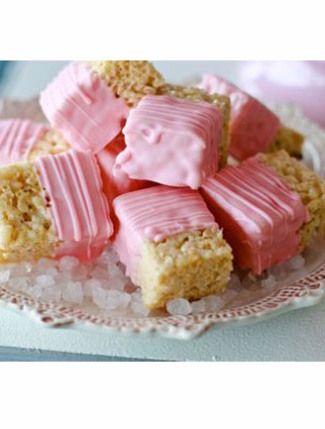 some pink marshmallows are on a plate